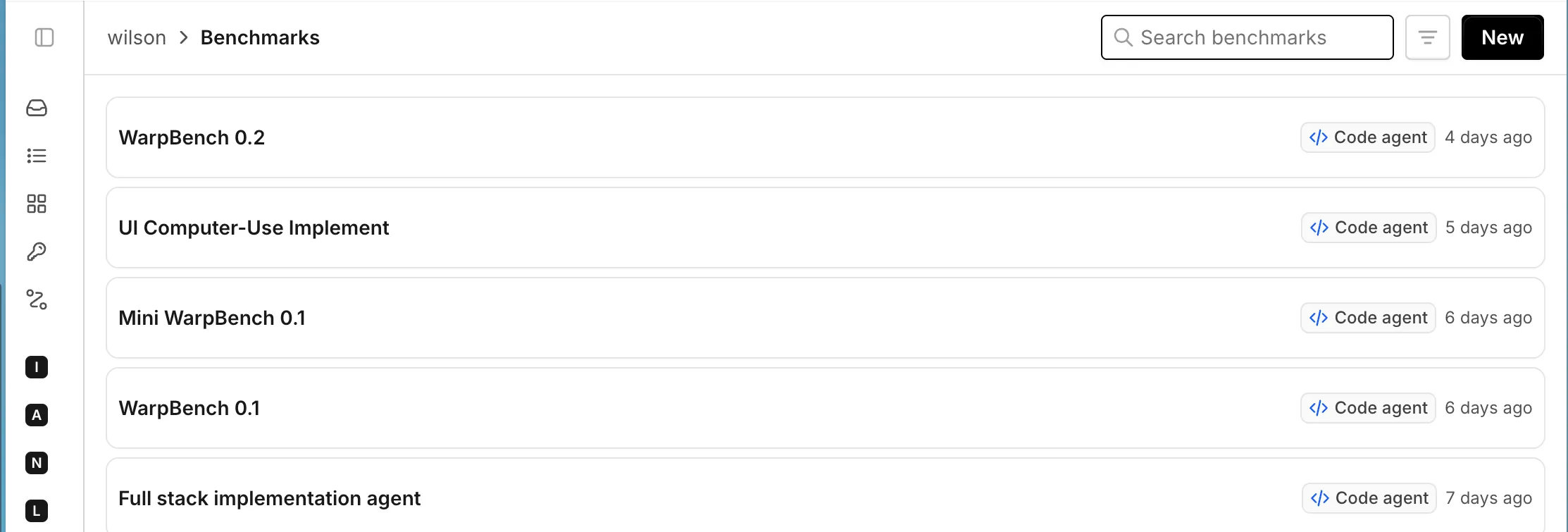 The Benchmarks page showing saved benchmark suites, a search field, and the New button.
